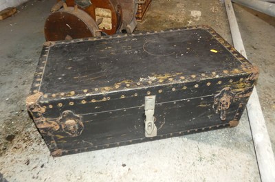 Lot 734 - A metal bound trunk, with leather handles
