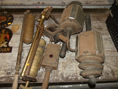 Lot 731 - Two brass fire extinguishers, two brass pumps,...