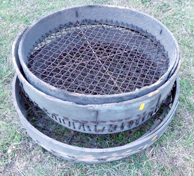 Lot 647 - Five various potato sieves/riddles