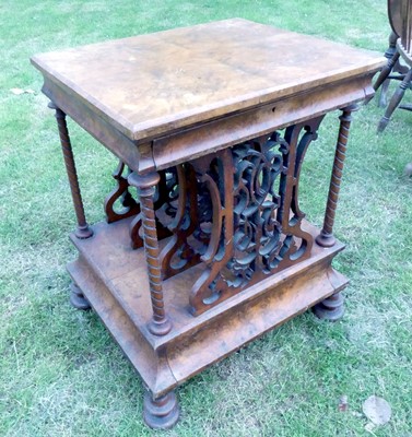 Lot 780 - A Victorian figured walnut Canterbury whatnot,...