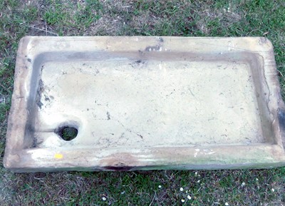 Lot 614 - An antique carved stone trough, w.62";...