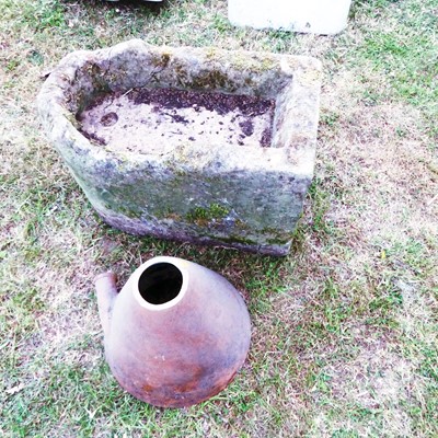 Lot 617 - A carved stone font; together with a glazed...