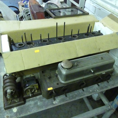 Lot 440 - A cylinder block head, manifold cover etc