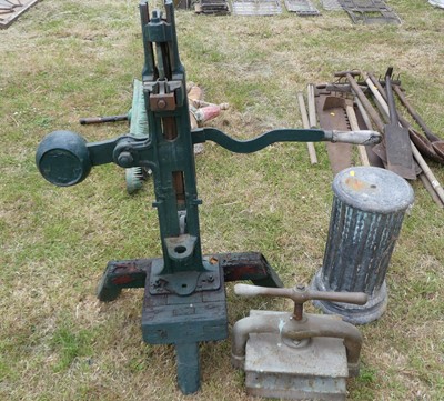 Lot 696 - A Victorian hand operated cast iron bottle...