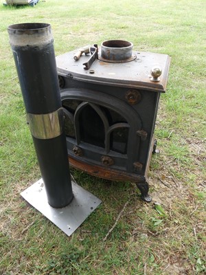 Lot 698 - A cast iron Evergreen Metal Products log burner
