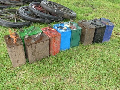 Lot 909 - A collection of eight petrol cans, to include...