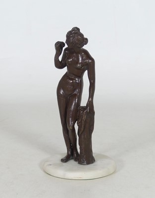Lot 18 - A reproduction bronzed metal figure of Venus...