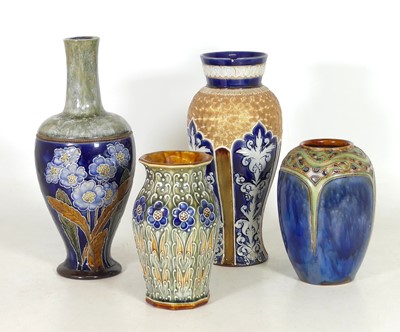 Lot 21 - A group of four Doulton stoneware vases, to...