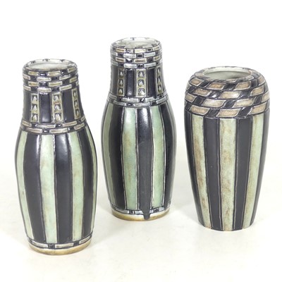 Lot 31 - A pair of Royal Doulton stoneware vases,...