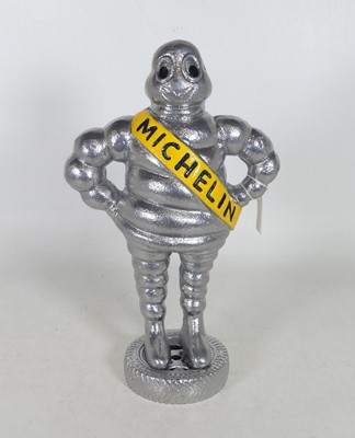 Lot 40 - A reproduction metal figure of the Michelin...