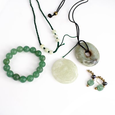 Lot 251 - A small collection of modern simulated jade...