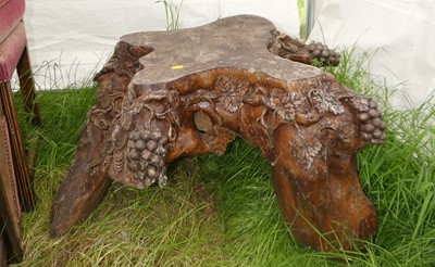 Lot 565 - A carved root table base (only)