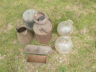 Lot 718 - Two small troughs; two metal jugs; a metal urn;...