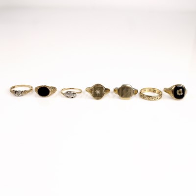 Lot 259 - Seven rings, comprising a 9ct yellow gold oval...