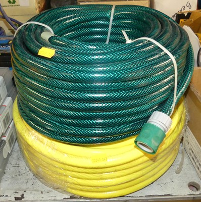 Lot 43 - Two brand new lengths of garden hose