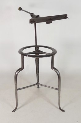 Lot 59 - A 19th century steel trivet, surmounted by a...