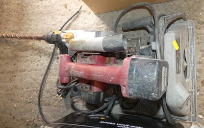 Lot 110 - A Titan Magnesium heavy duty power drill; and...