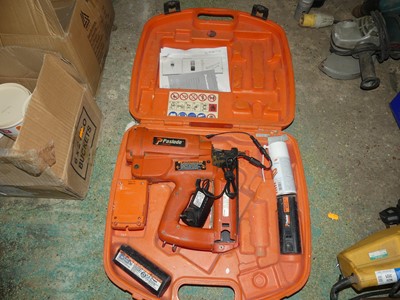 Lot 137 - A Paslode Impulse type 2 nail gun, with carry...