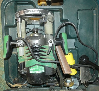 Lot 141 - A Hitachi M12V2 heavy duty plunge router, in...