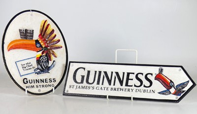 Lot 81 - A reproduction cast metal Guinness advertising...
