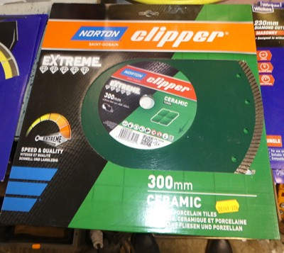 Lot 227 - Two Norton Clipper 300 x 20mm ceramic...
