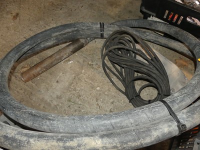 Lot 249 - A heavy duty concrete poker