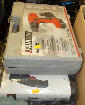 Lot 304 - A Fairline cordless drill; together with a...