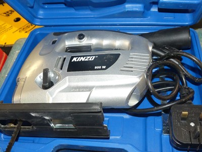 Lot 305 - A Kinzo 800w jigsaw; together with a Makita...