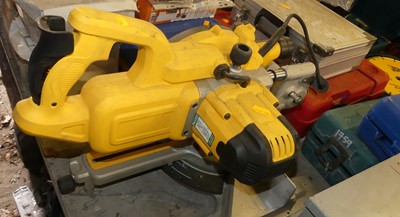 Lot 309 - A Dewalt DWS773 angle disc saw