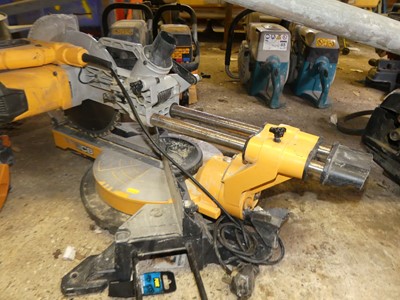 Lot 361 - A JCB mitre saw; together with an Evolution...