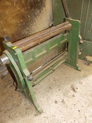 Lot 384 - A metal sheet roller