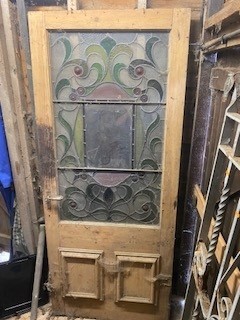 Lot 592 - A Victorian pine and lead glazed door,...