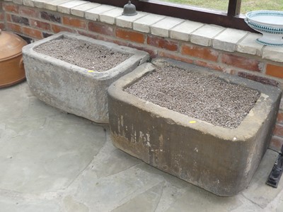 Lot 611 - Two early stone D-shaped troughs