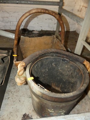 Lot 662 - A coopered oak and brass bound fire bucket;...