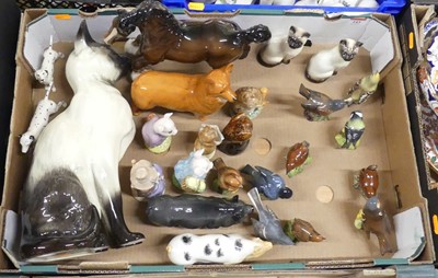 Lot 143 - A collection of Beswick, to include a Siamese...