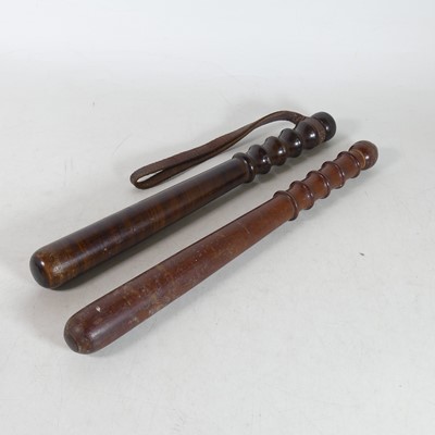 Lot 203 - Two early 20th century turned wooden...