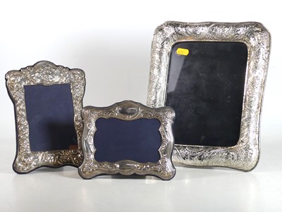 Lot 223 - A modern silver-clad easel photograph frame,...