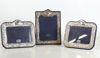 Lot 227 - A pair of modern silver-clad easel photograph...
