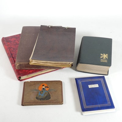 Lot 211 - Two photograph albums, the contents mainly...