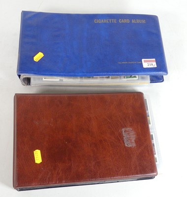 Lot 218 - A collection of trade cards, to include...