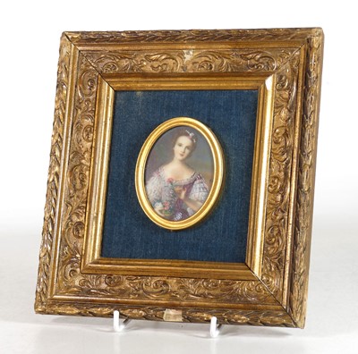 Lot 94 - A reproduction portrait miniature of a lady...