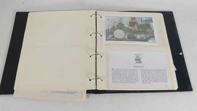Lot 220 - A collection of commemorative coin covers, and...