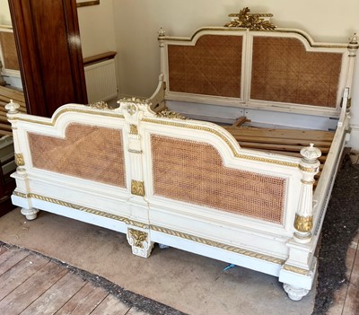 Lot 607 - A French Super King Size cream and gilt...