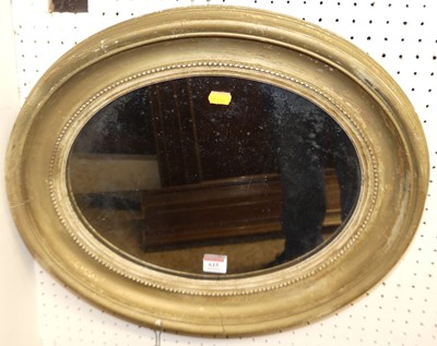 Lot 615 - An early 20th century gilt wood framed oval...