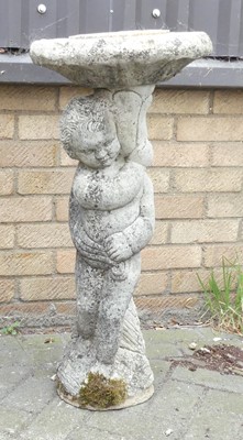 Lot 748 - A reconstituted garden figural sundial, h.80cm