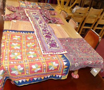 Lot 627 - A collection of various embroidered Eastern...