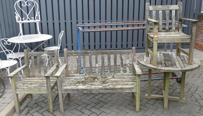 Lot 755 - A slatted teak garden furniture set, to...