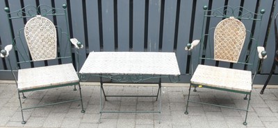 Lot 757 - A green painted wrought iron and wicker inset...
