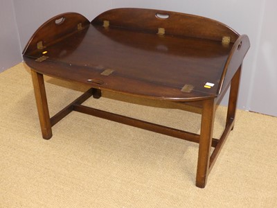 Lot 631 - A contemporary mahogany and flush brass inset...