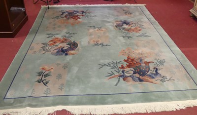 Lot 742 - A Chinese jade green ground and floral...